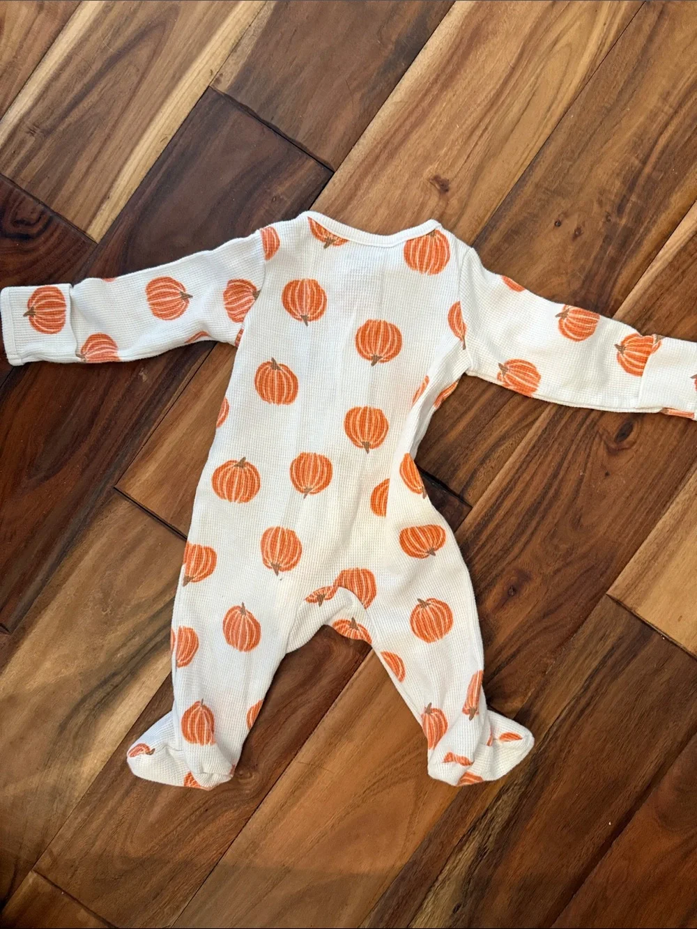 Carter's Cream Footed One-Piece with Orange Pumpkin Pattern